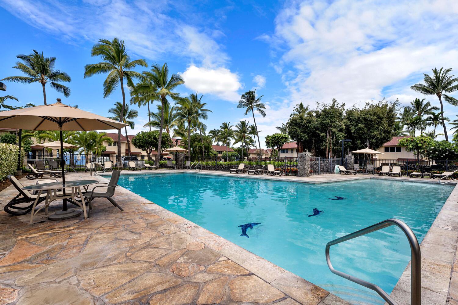 Kailua Kona Vacation Rentals, Keauhou Kona Surf & Racquet 1104 - Take a refreshing dip in the pristine pool – your personal oasis for relaxation and fun under the sun.