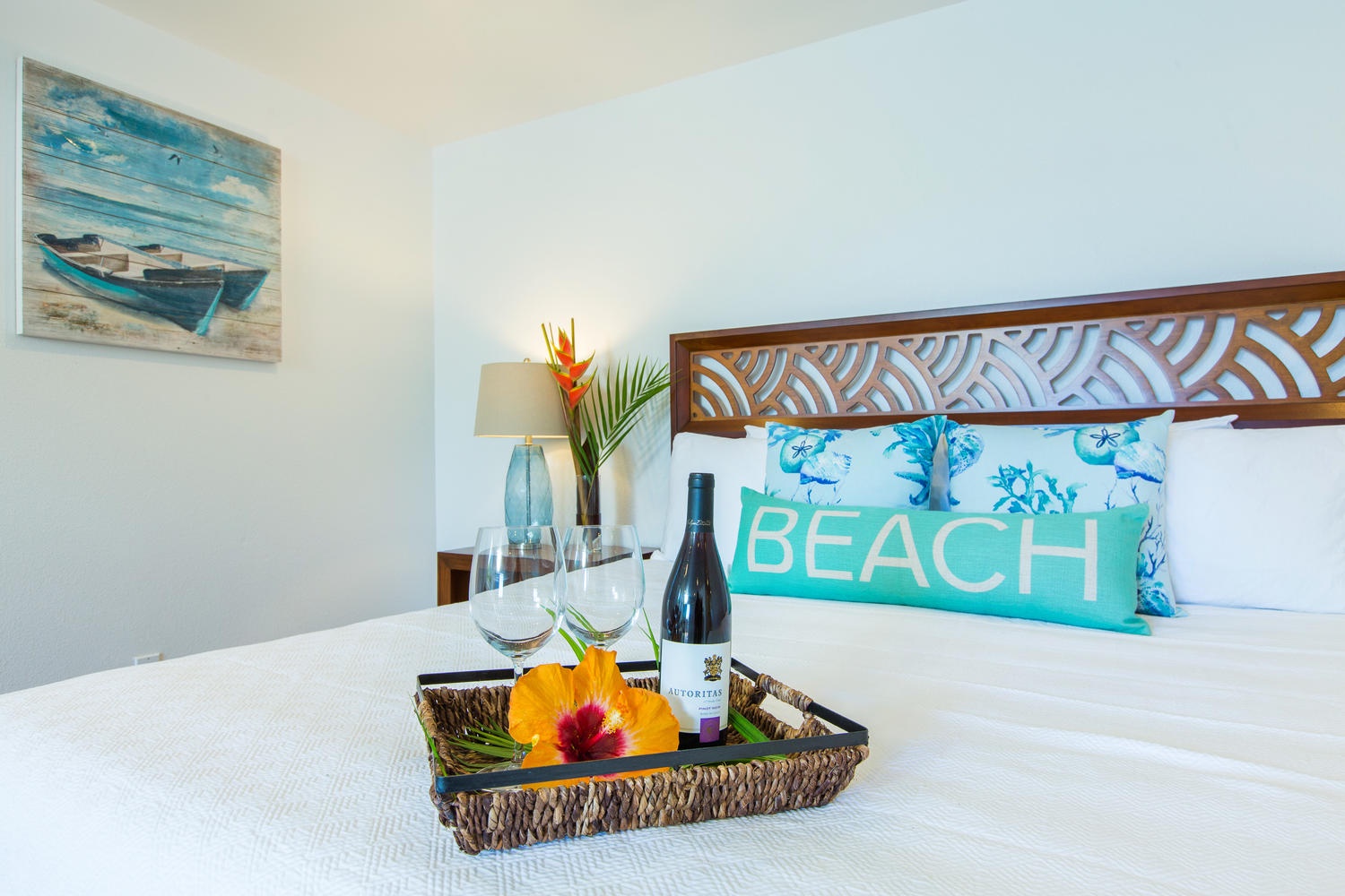 Honolulu Vacation Rentals, Mahina Kai - The downstairs primary bedroom with sliding doors that lead to the pool lanai.