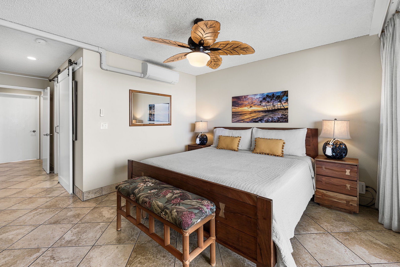 Kailua Kona Vacation Rentals, Keauhou Kona Surf & Racquet 1104 - Room to move around the king bed, with a bench at the foot for the beach bag.