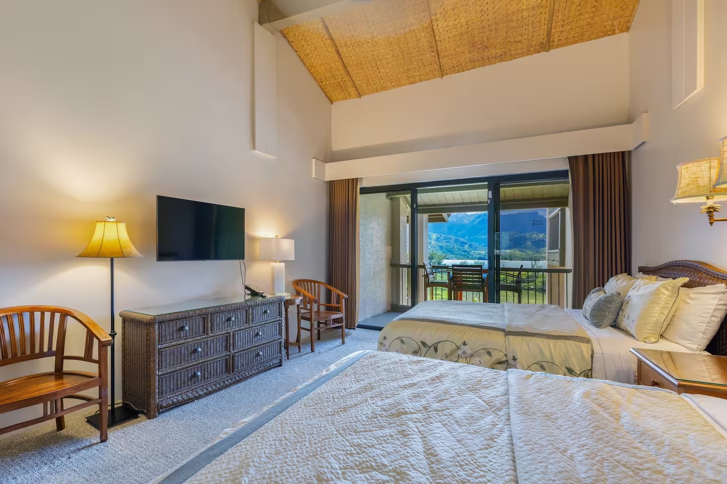 Princeville Vacation Rentals, Hanalei Bay Resort 4301/2/3 - Watch your favorite show or enjoy the mountain views on the lanai. – Relax with the best of both worlds indoors and outdoors.
