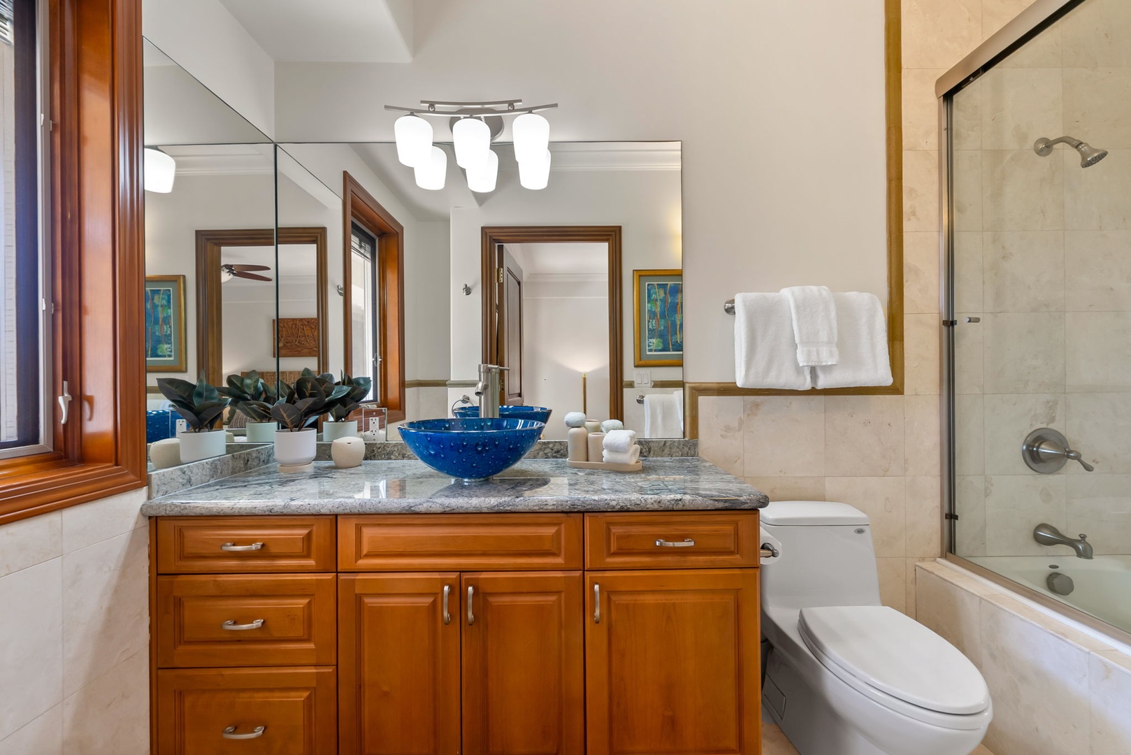Honolulu Vacation Rentals, Maunalua Estate - Granite countertops, soft lighting, and thoughtful finishes create a bright, welcoming ensuite.