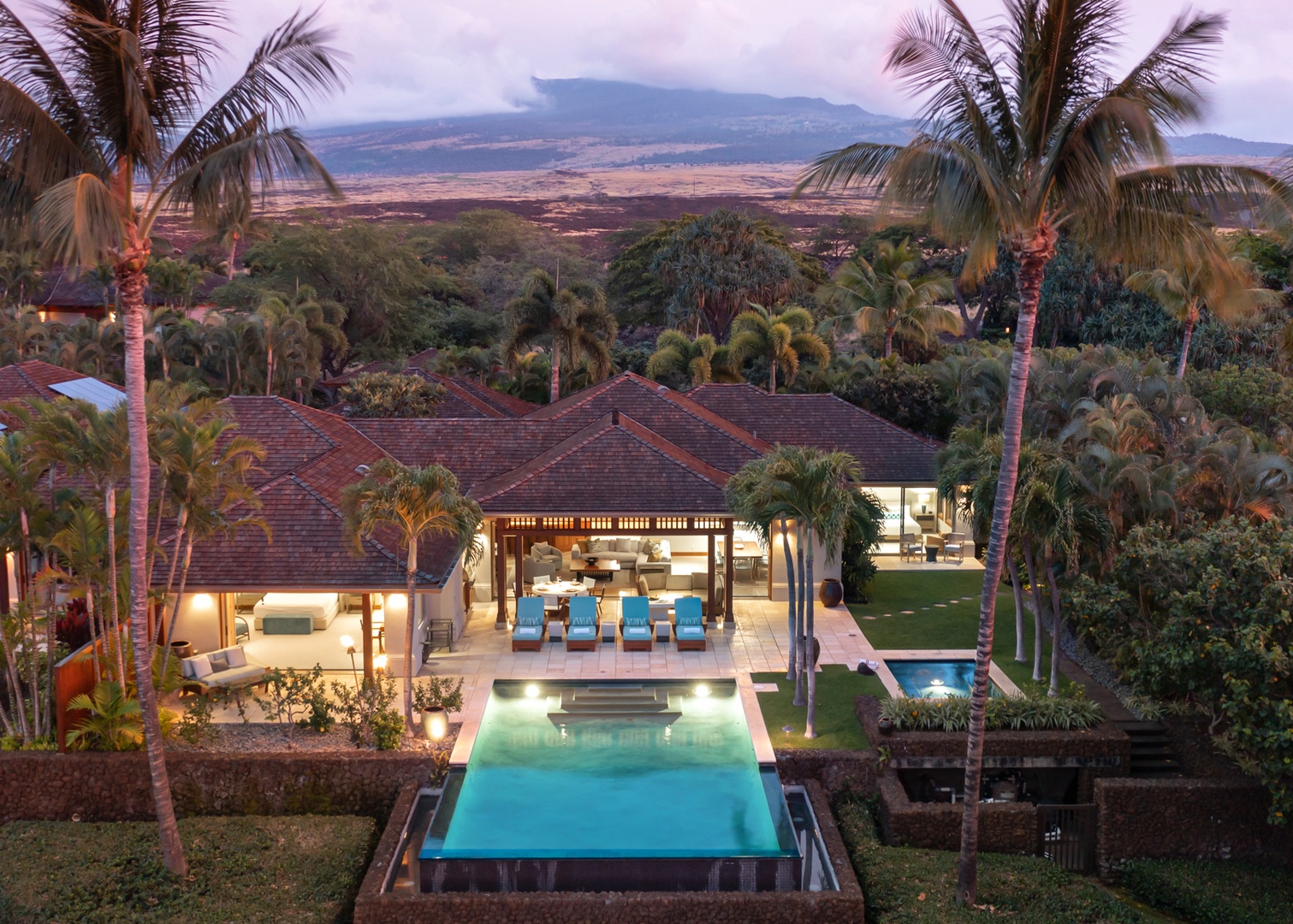 Kailua Kona Vacation Rentals, 4BD Hainoa Estate (102) at Four Seasons Resort at Hualalai - Aerial view of the estate as it is hit with pink hues during sunset