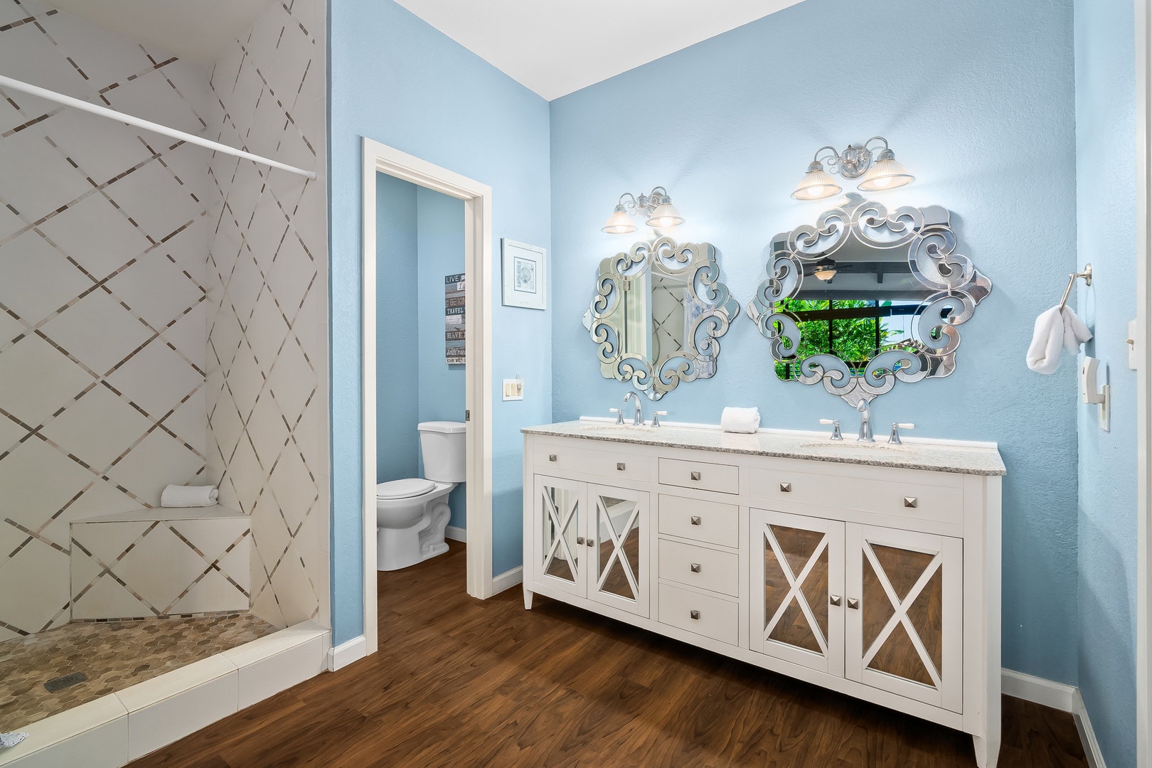Princeville Vacation Rentals, Mauna Kai 7B - The walk-in shower and double vanity make morning routines simple for two.