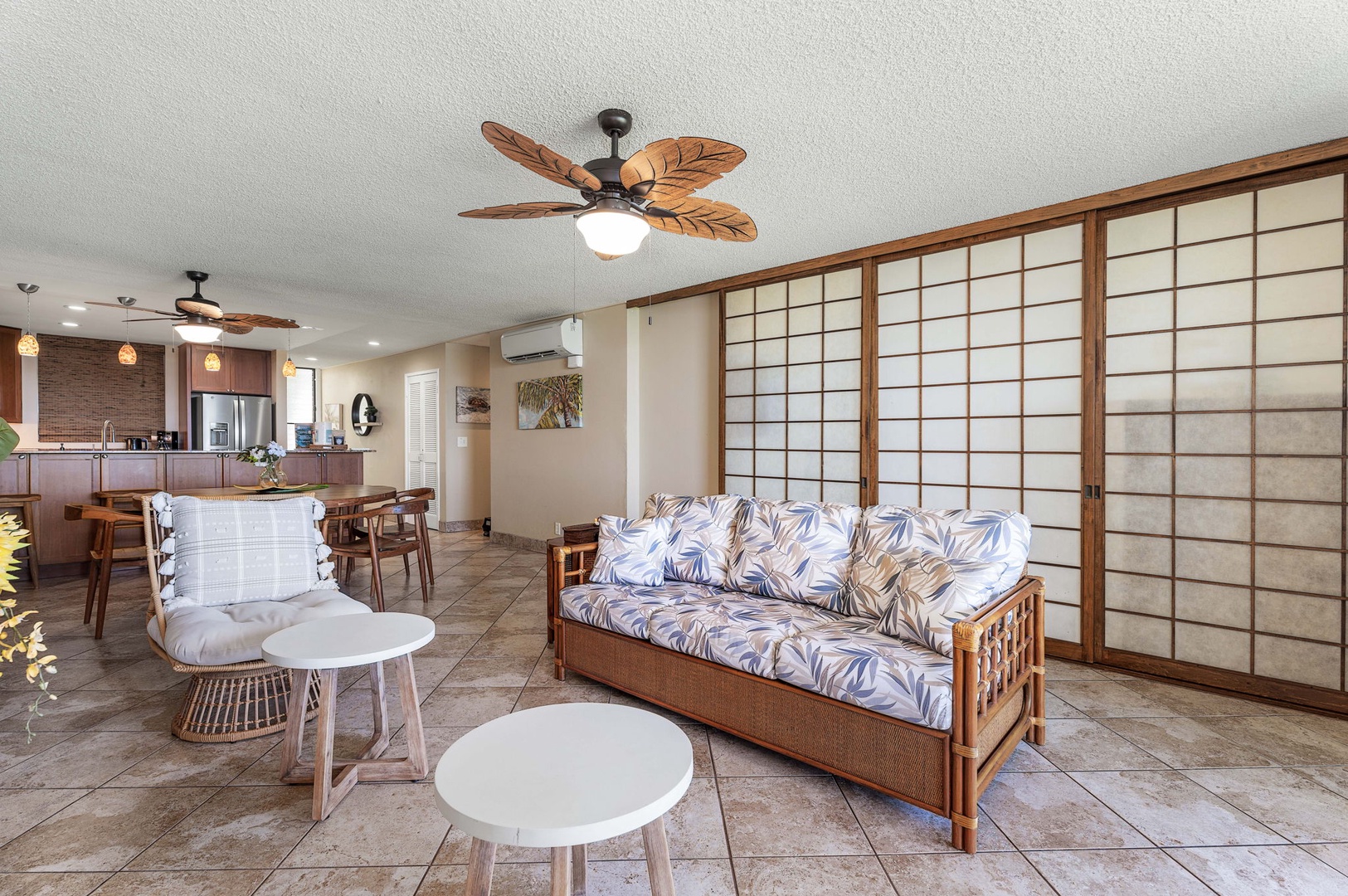 Kailua Kona Vacation Rentals, Keauhou Kona Surf & Racquet 1104 - Retreat in the living area with plush couches and occasional seats.