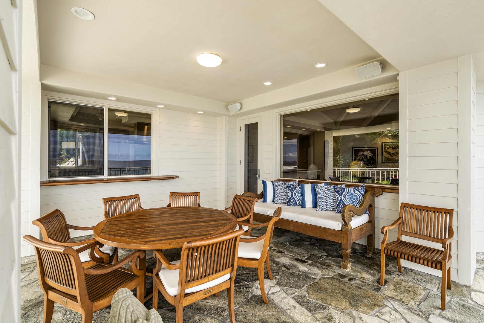 Kailua Kona Vacation Rentals, Ali'i Point #12 - Outdoor dining and lounge-style seating on the oceanfront lanai—perfect for sunset meals or morning coffee.