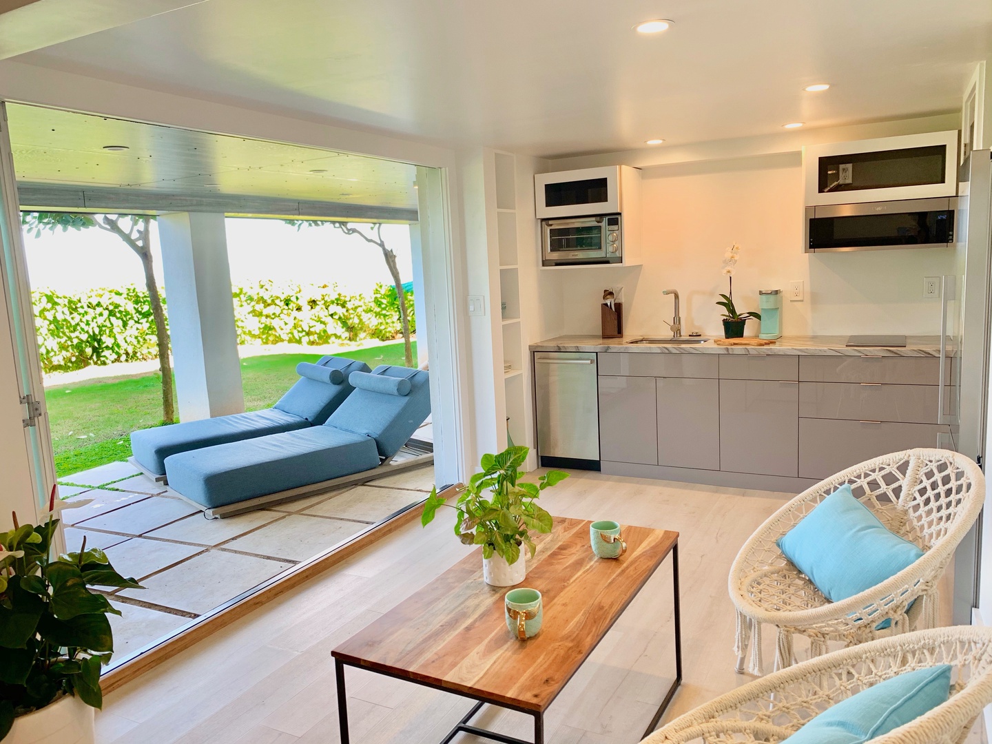 Waialua Vacation Rentals, Sea of Glass* - Downstairs studio kitchen and outdoor lanai
