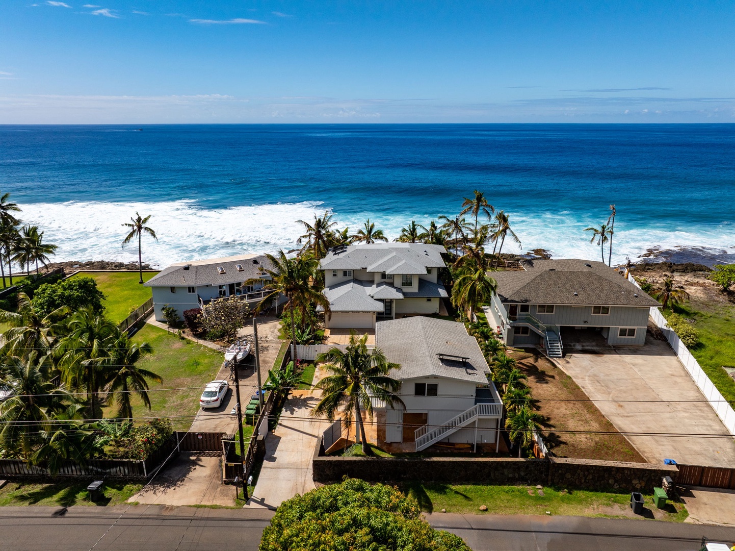 Waianae Vacation Rentals, Oceanfront Luxury Dream Estate - An aerial view directly above the home shows the property lines extending to the shoreline below.