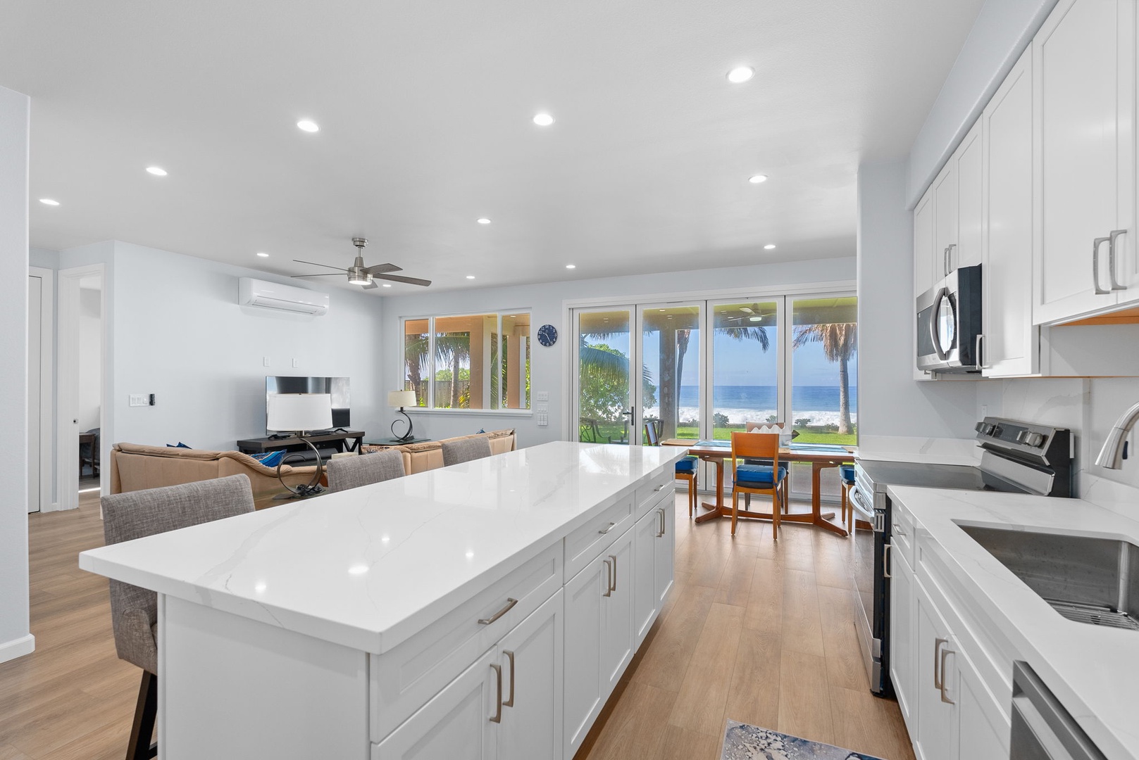 Waianae Vacation Rentals, Oceanfront Luxury Dream Estate - Panoramic prep space with island counter and ocean views extending through the home.