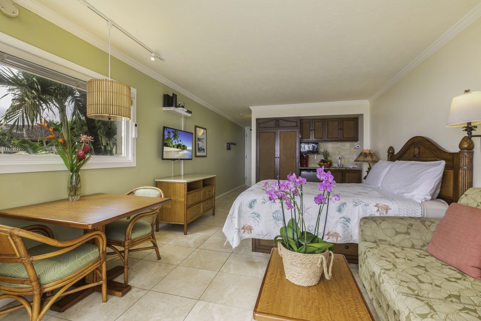 Kapa'a Vacation Rentals, Islander on the Beach #232 - The studio room features a split AC and TV.