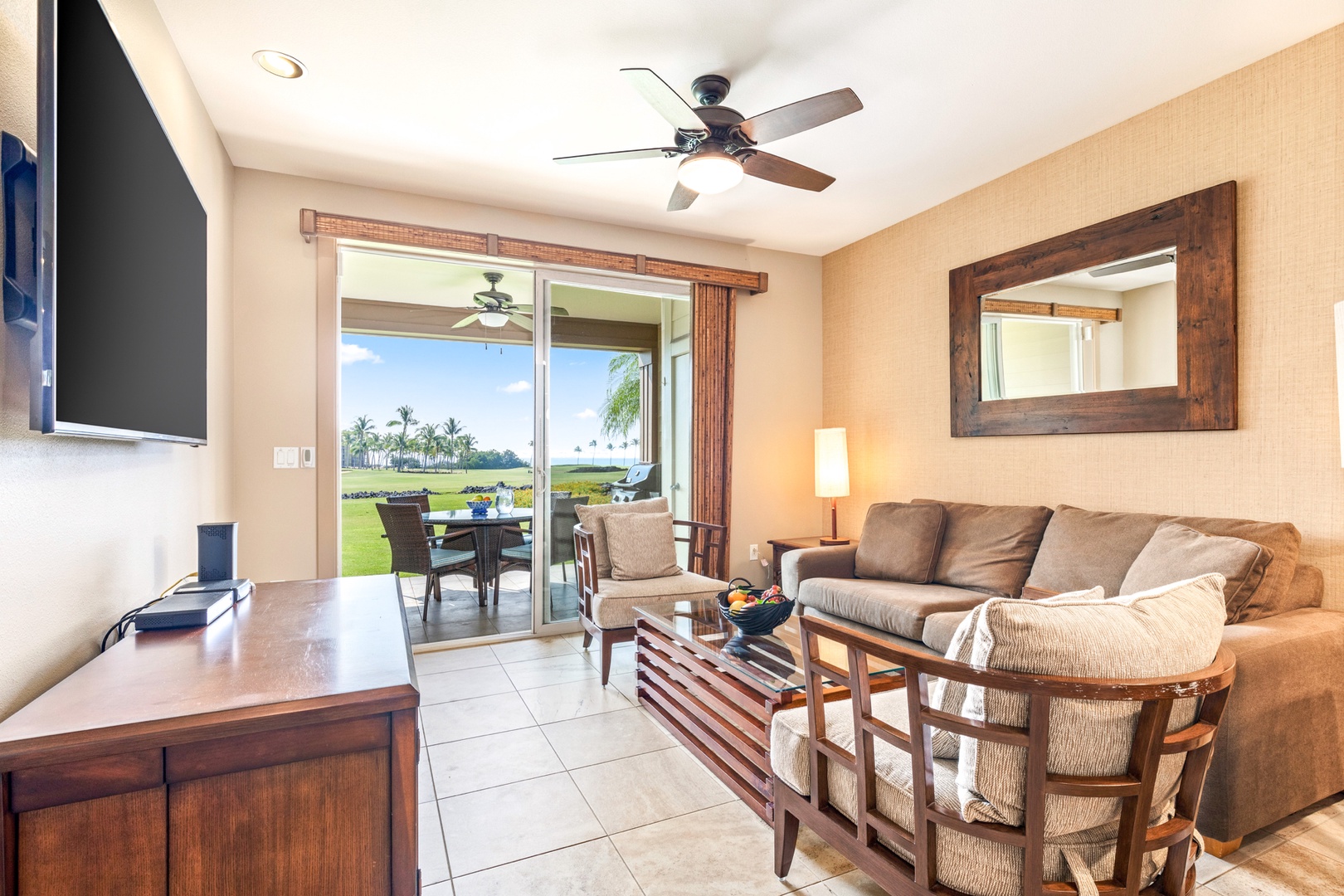 Waikoloa Vacation Rentals, 2BD Hali'i Kai 12C at Waikoloa Resort - Closer view of living room seating. Sleeper sofa can accommodate up to 2 extra guests (must be approved and extra guest fees apply).