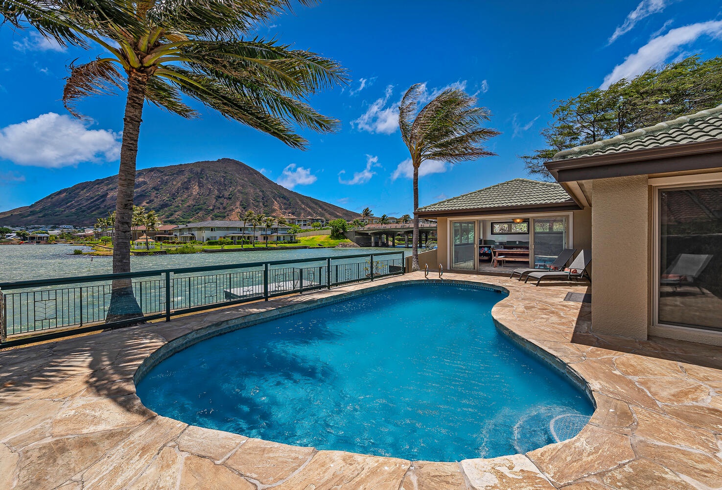 Honolulu Vacation Rentals, Nani Wai - Relax poolside, taking in the stunning marina and majestic Koko Crater vistas.