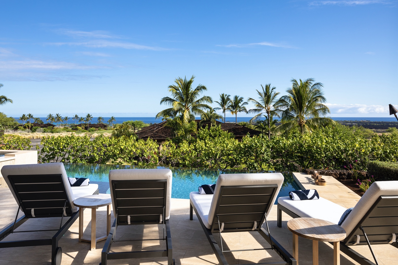 Kailua Kona Vacation Rentals, 4BD Kulanakauhale (3558) Estate Home at Four Seasons Resort at Hualalai - Poolside loungers offer endless relaxation opportunities.