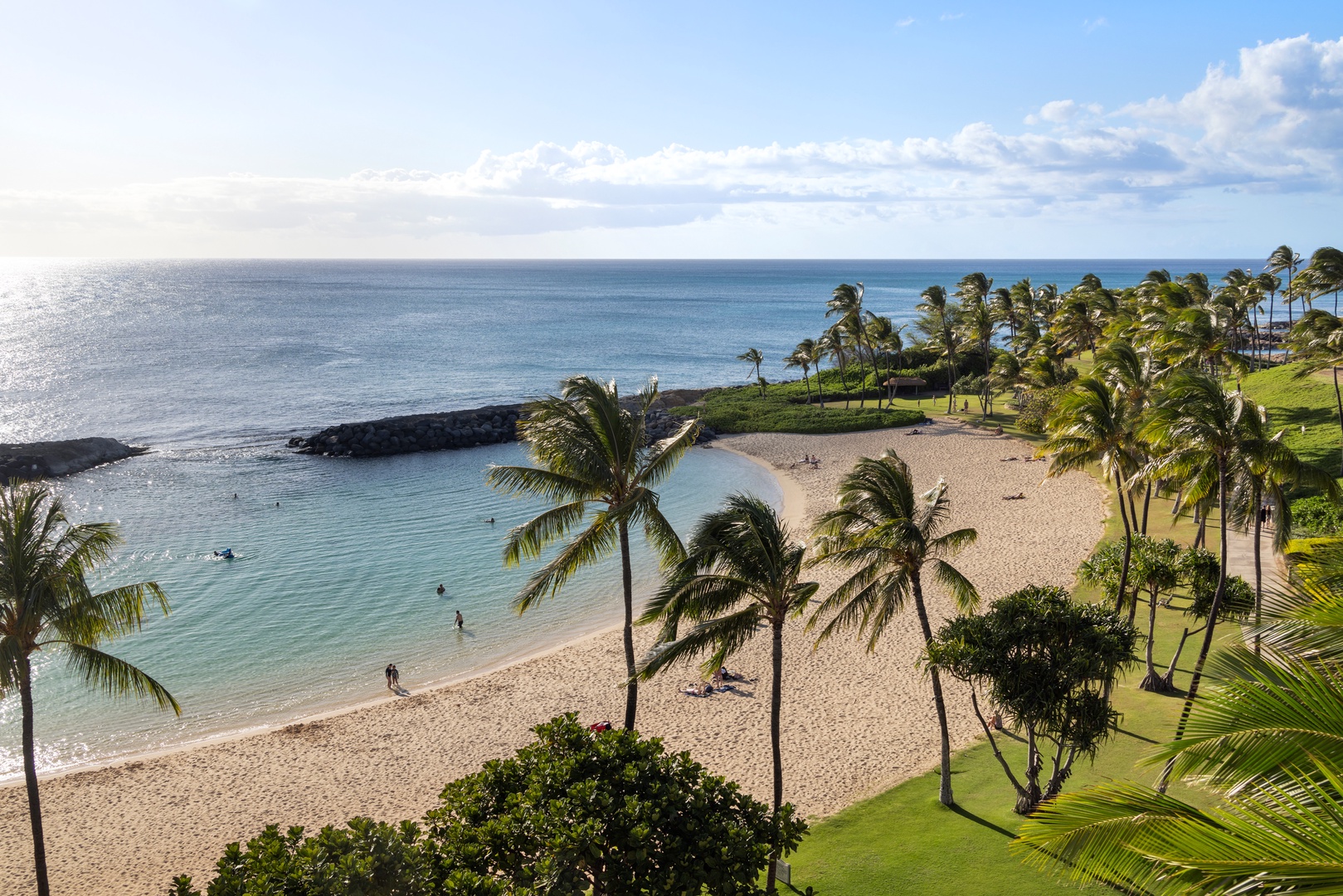 Kapolei Vacation Rentals, Ko Olina Beach Villas B610 - The lagoon is the perfect spot to relax under the trees and enjoy the beach.