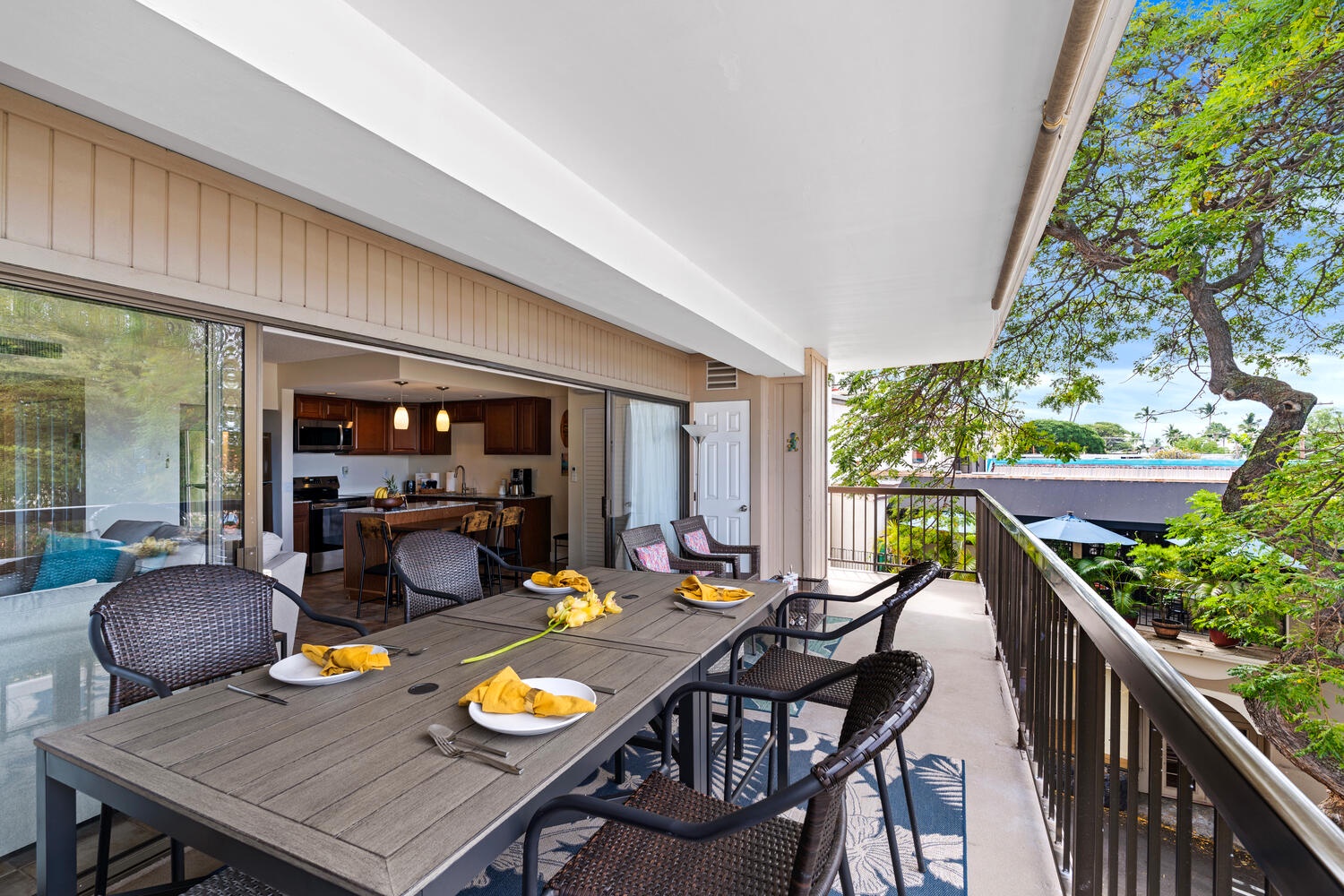 Kailua Kona Vacation Rentals, Kona Plaza 201 - Outdoor dining with stunning garden views—fresh air and tropical scenery await.