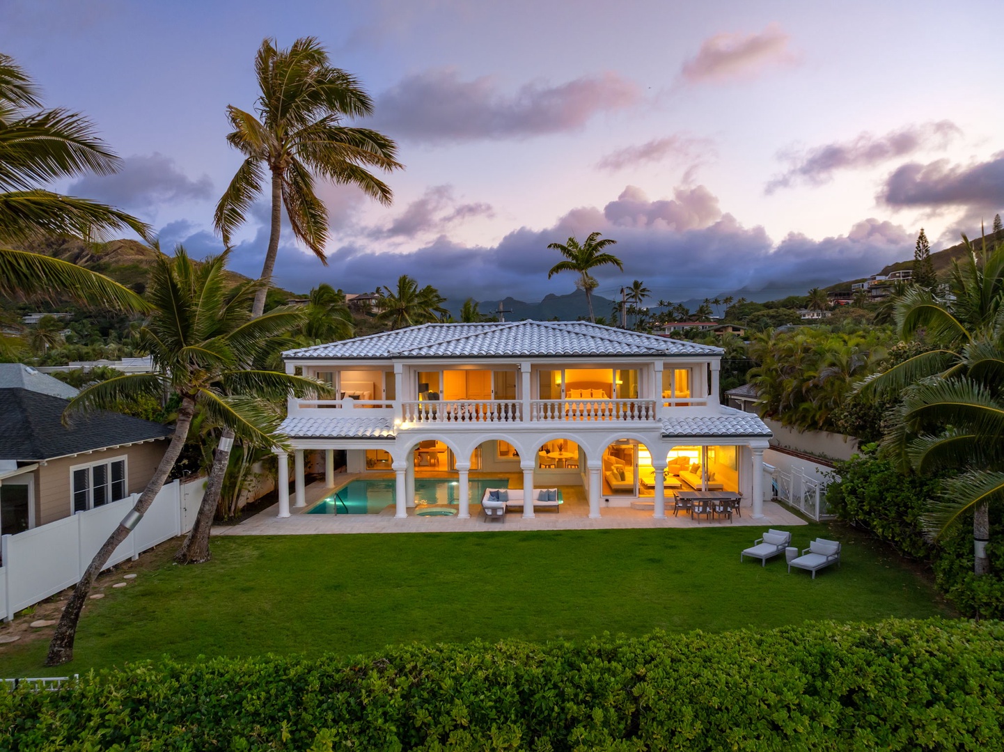 Kailua Vacation Rentals, Lanikai Sunrise Estate - Evening glow wraps the estate, showcasing the stunning beachfront setting just steps from your door.