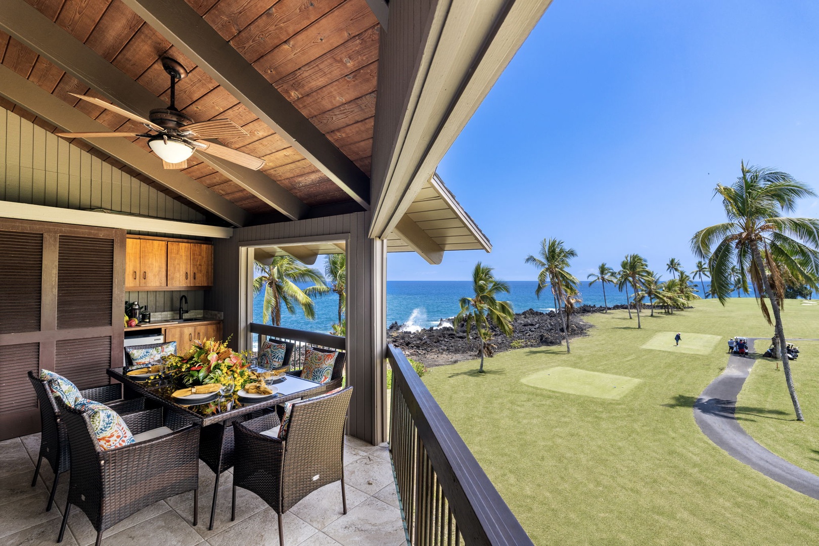 Kailua Kona Vacation Rentals, Kanaloa at Kona 1606 - Dinner on the lanai comes with a straight shot to the Pacific over the palms.