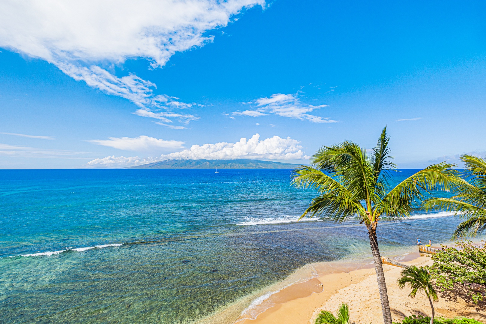 Lahaina Vacation Rentals, Kaanapali Shores 502 - Take in the stunning panoramic views of the ocean and nearby islands, a perfect backdrop for a day of relaxation by the shore.