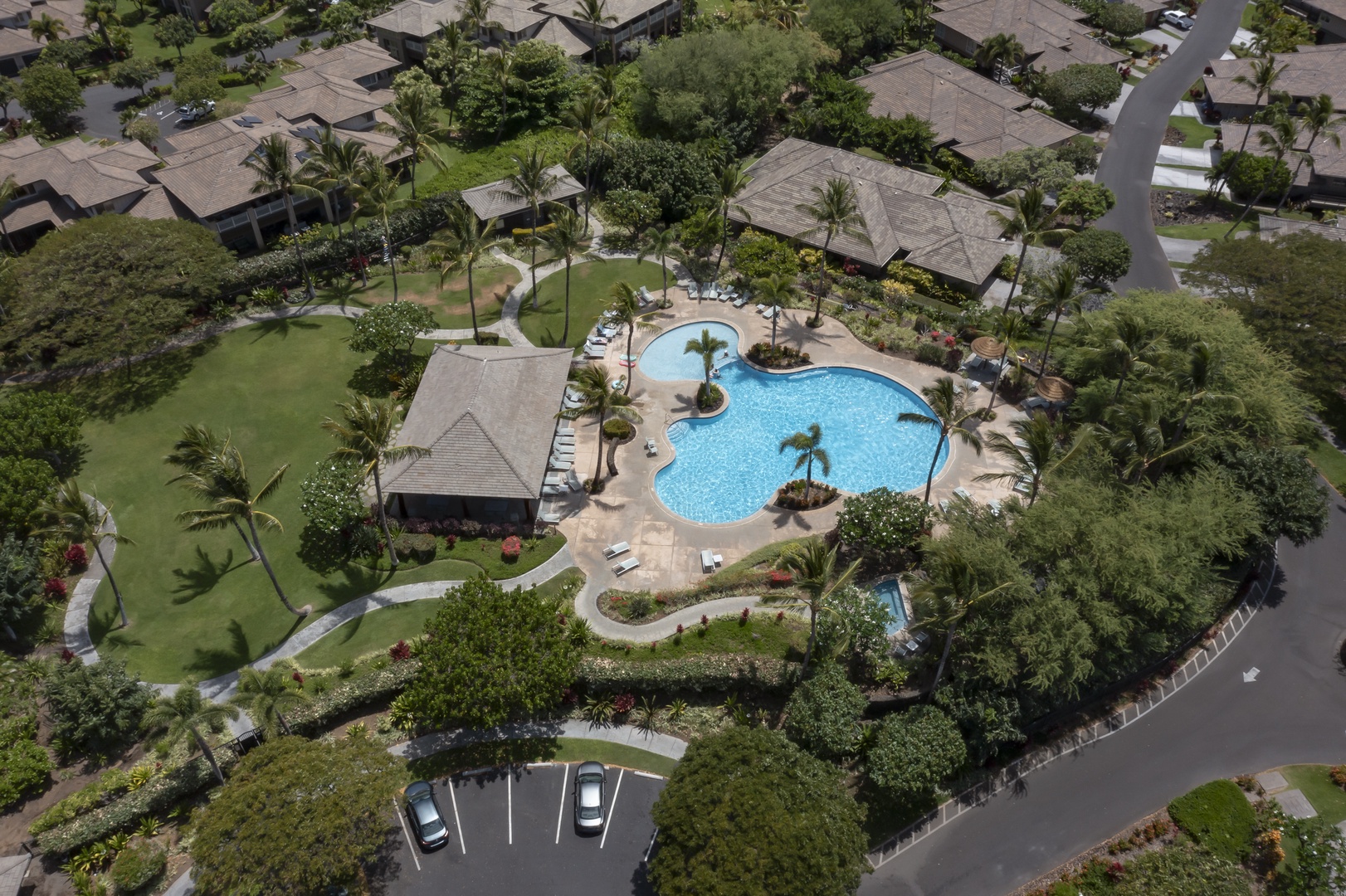 Kamuela Vacation Rentals, Mauna Lani KaMilo #503 - A bird’s-eye view of the lush KaMilo community reveals the stunning pool pavilion nestled in paradise.