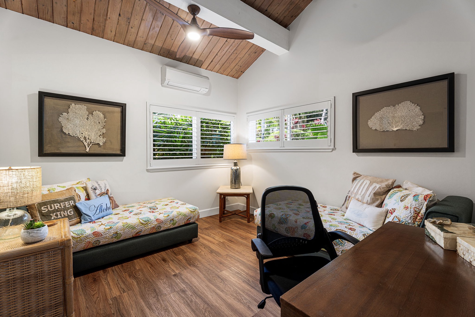 Kailua Kona Vacation Rentals, Hale Pua - Settle into a cozy guest room, perfect for rest, reading, or planning the day ahead.