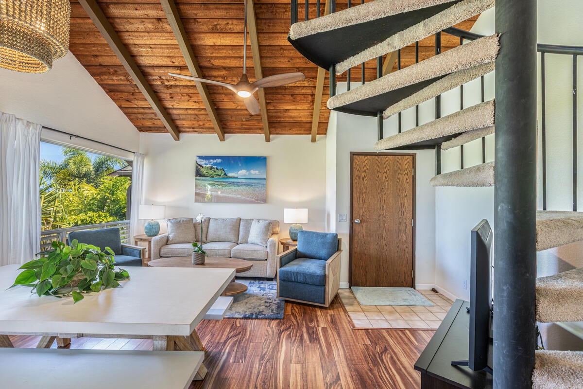 Princeville Vacation Rentals, Hale Ohana Ho'omaka - Spacious layout featuring a spiral staircase leading to the loft. Bright, open, and full of island charm.