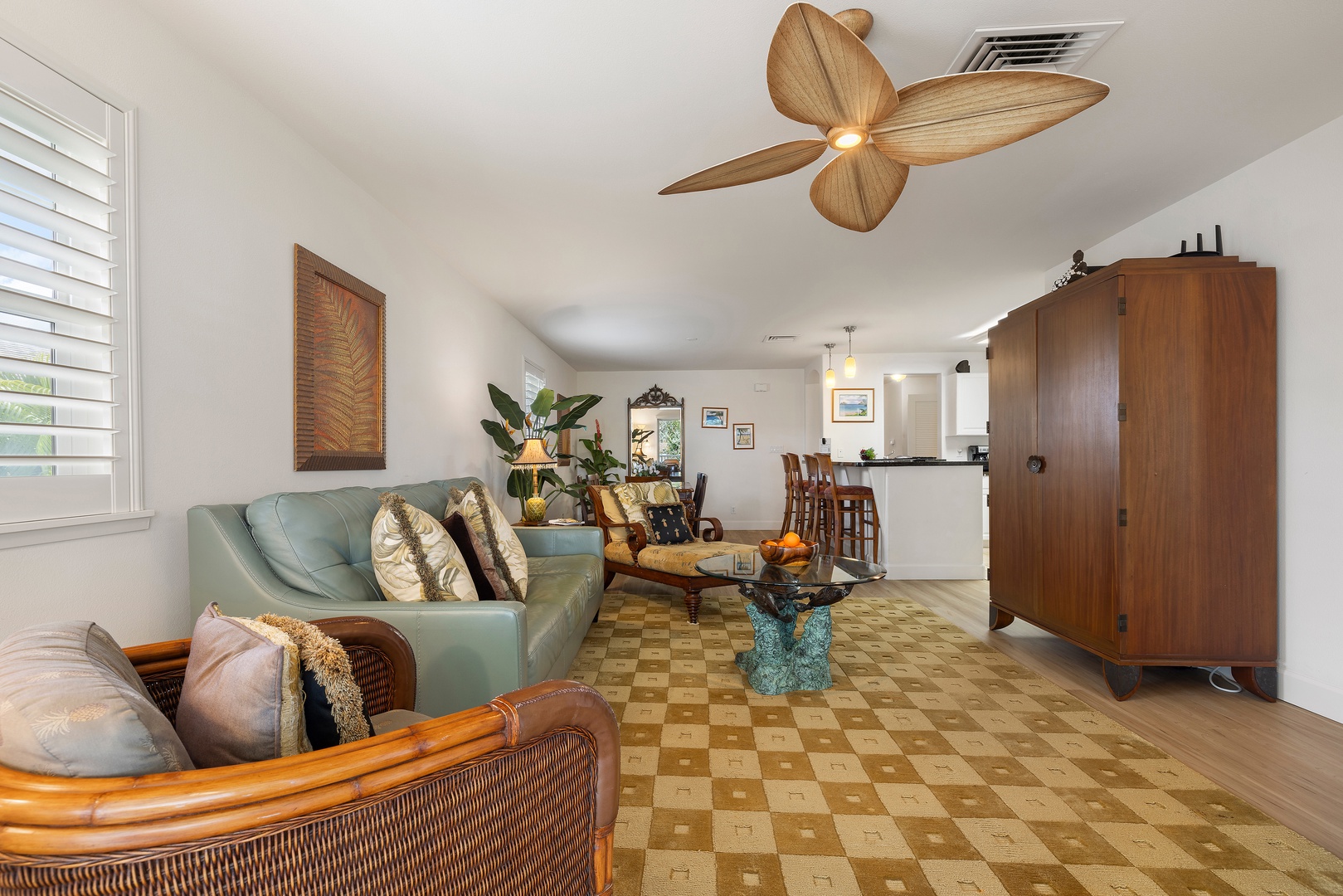 Kapolei Vacation Rentals, Ko Olina Kai 1105E - Relax in your tropical-inspired living area, where coastal charm meets comfort. Ceiling fans, plush seating, and island-style décor create the perfect retreat after a day of adventure.