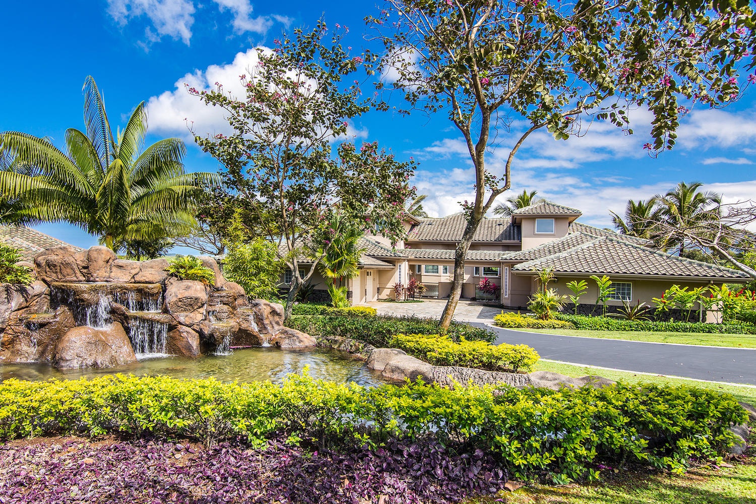 Princeville Vacation Rentals, Hale Moana - Just a short walk from your home you’ll find the heated community pool surrounded by terraced lava rocks and tropical flowers. For those who love a little exercise there's a 2 mile walk jog path winding through Princeville community that allows gorgeous m