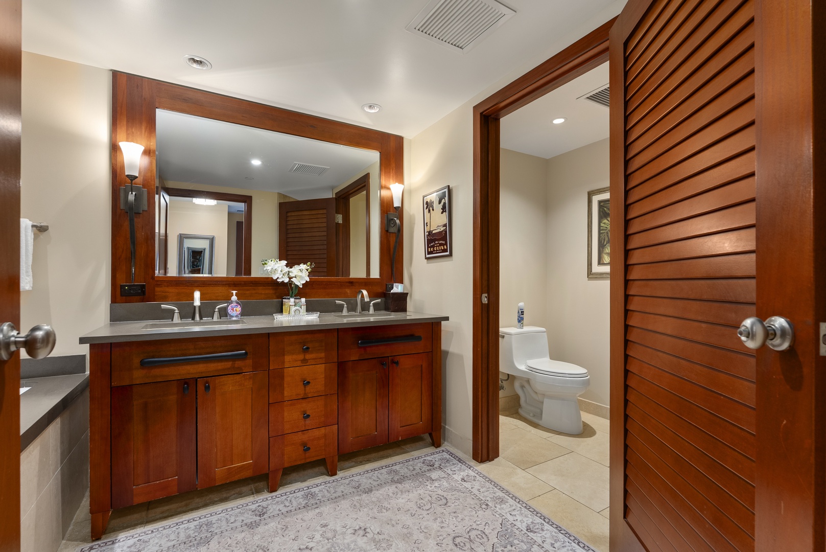 Kapolei Vacation Rentals, Ko Olina Beach Villas O1404 - Twin sinks at the primary-bath vanity, so no one waits their turn before dinner.