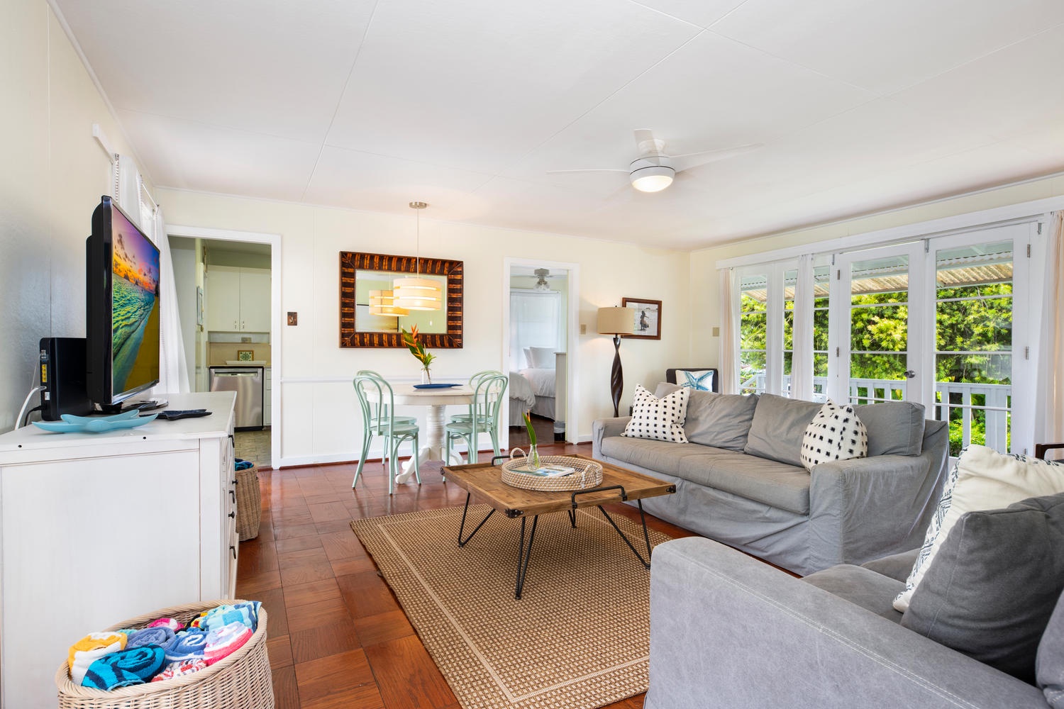 Kailua Vacation Rentals, Lanikai Cottage - Main house living room opens to the front and back yard and in-ground pool!