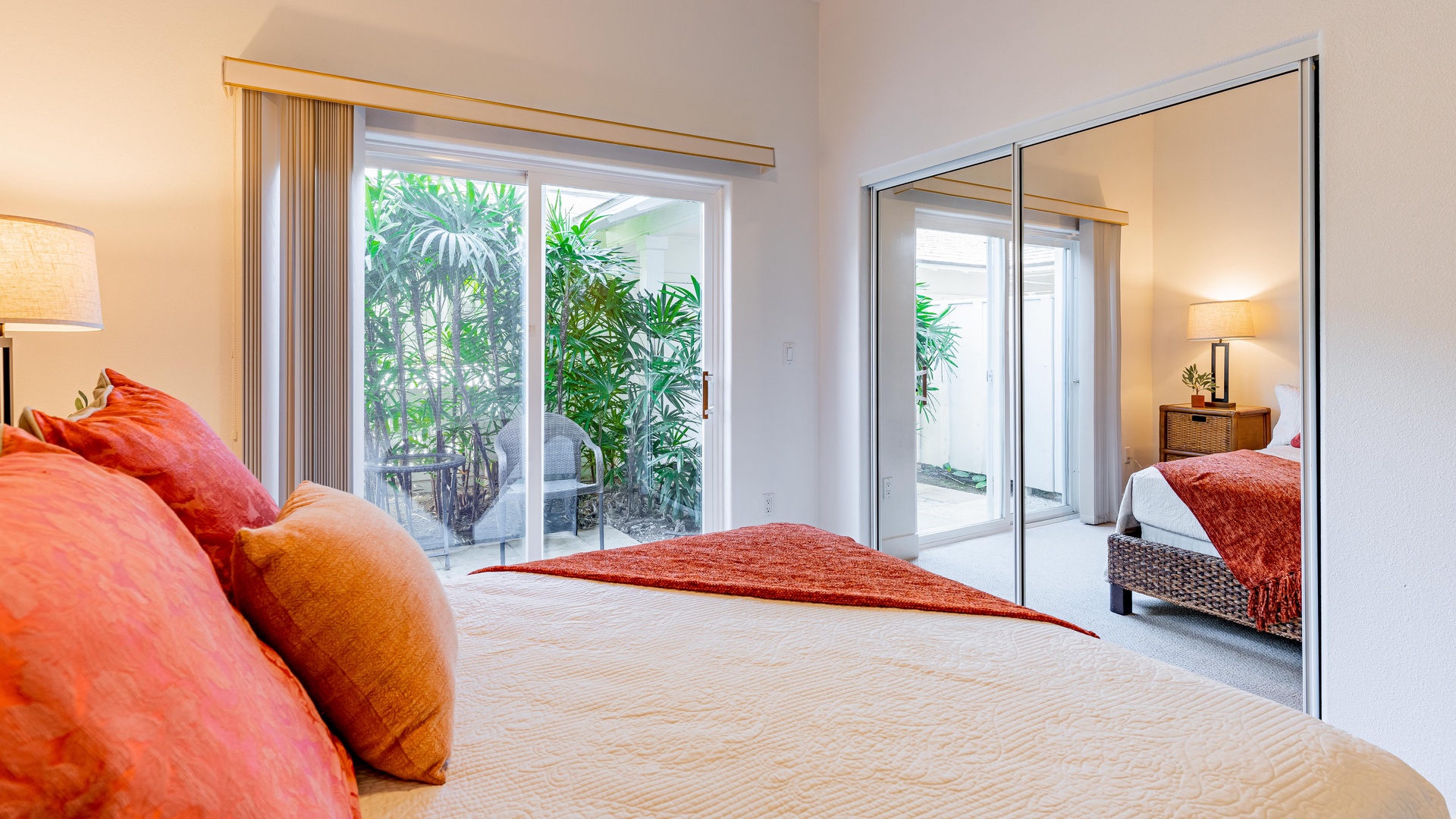 Kapolei Vacation Rentals, Coconut Plantation 1074-1 - The first floor guest bedroom with access to a small private lanai.