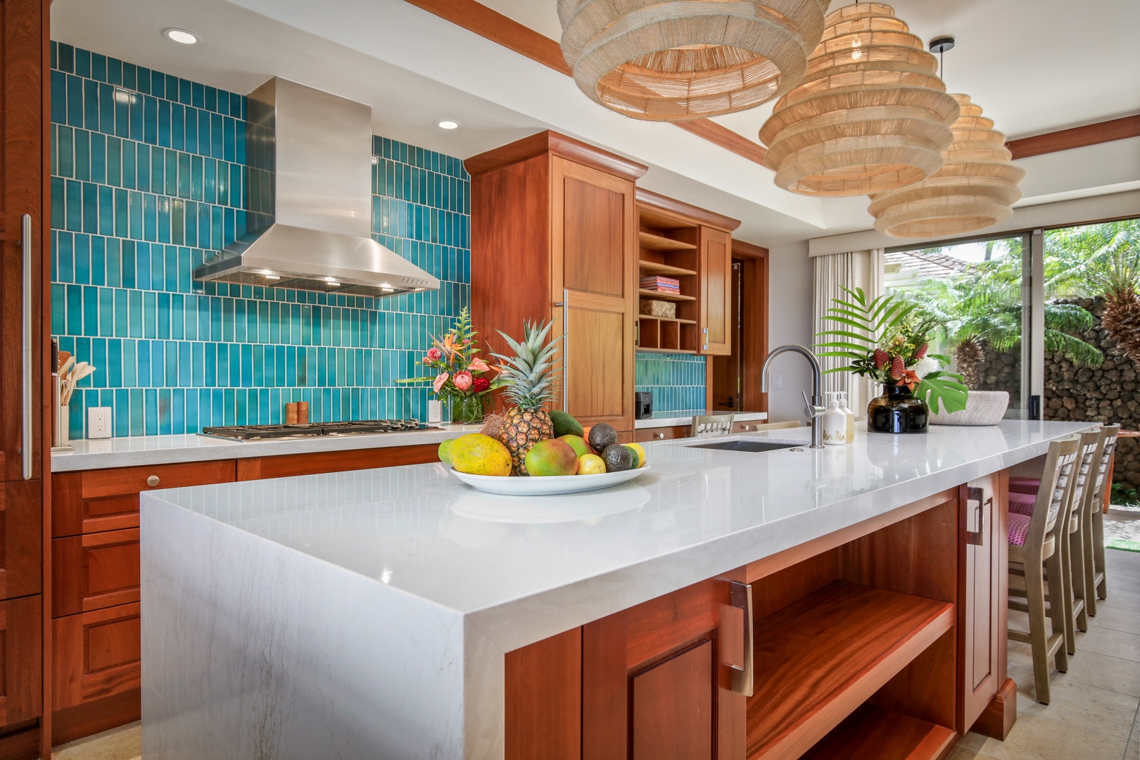 Kailua Kona Vacation Rentals, 4BD Hainoa Estate (122) at Hualalai Resort - Breakfast bar seating and sliding doors to a cafe table outside for an open air bite.