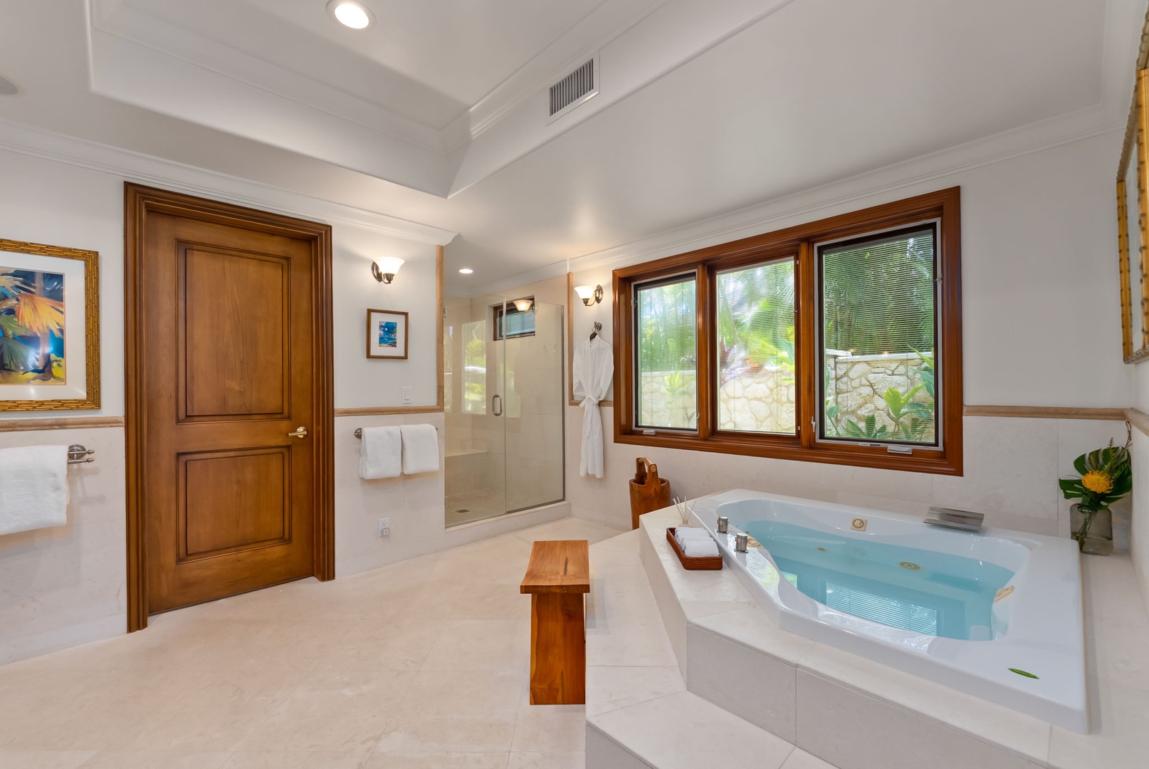 Honolulu Vacation Rentals, Maunalua Estate - Unwind beside the soaking tub in a spacious bathroom designed for comfort and quiet relaxation.