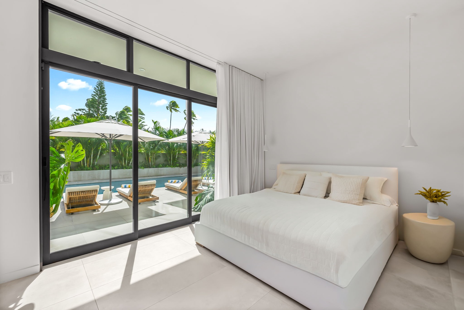 Kailua Vacation Rentals, Kailua Beach Escape - Wake to tropical greenery and enjoy seamless access to the private outdoor spaces.