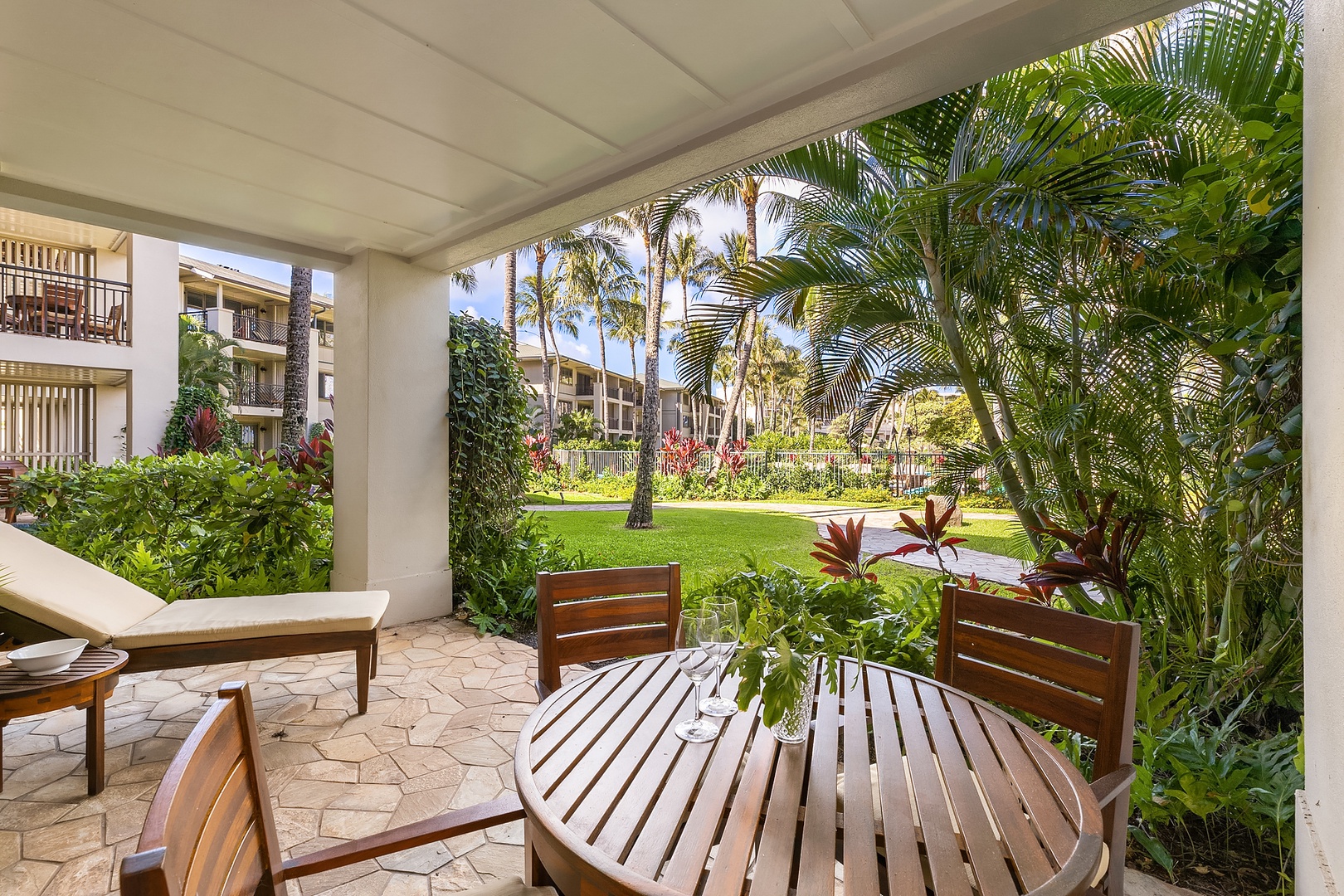 Kahuku Vacation Rentals, Turtle Bay Villas 112 - Ground floor lanai with easy access to the pool and beach lagoon in front.