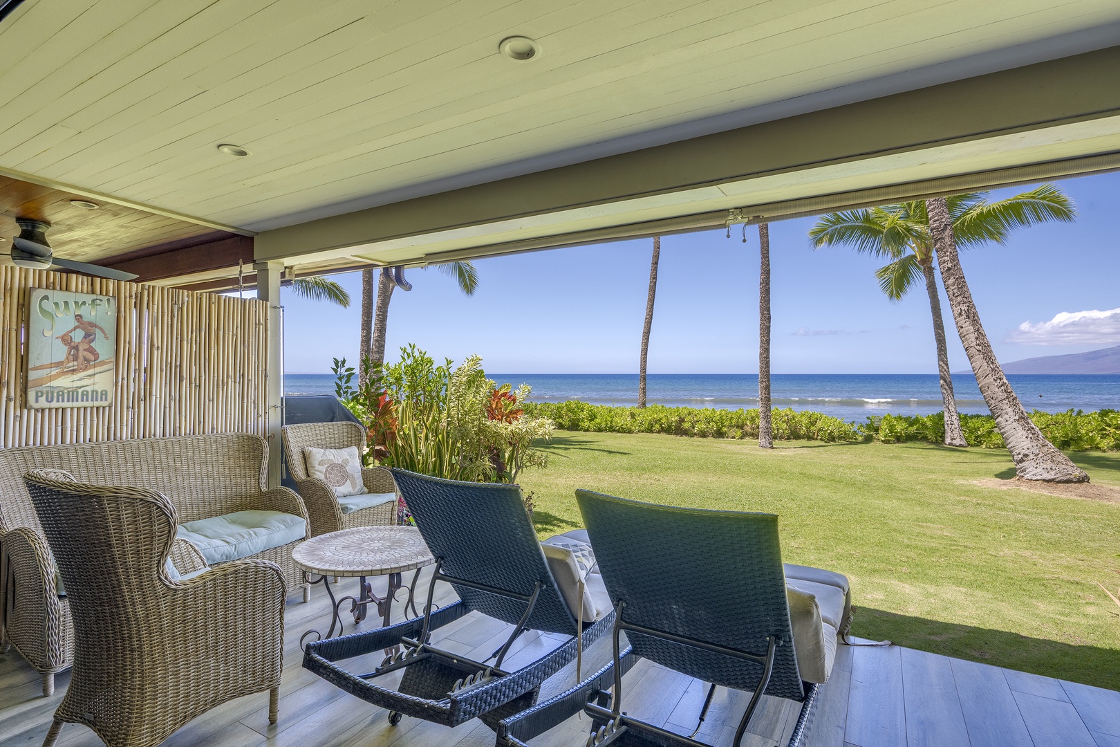 Lahaina Vacation Rentals, Puamana 240-3 - Unwind on the lanai with panoramic oceanfront views, where paradise meets relaxation.