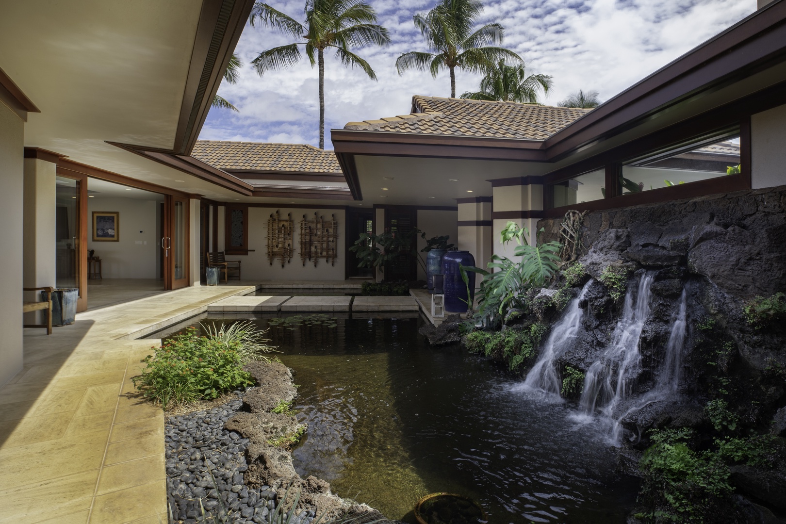Kamuela Vacation Rentals, Champion Ridge 7 - Step into your own private paradise with a stunning waterfall cascading into tranquil koi ponds, creating natural serenity.