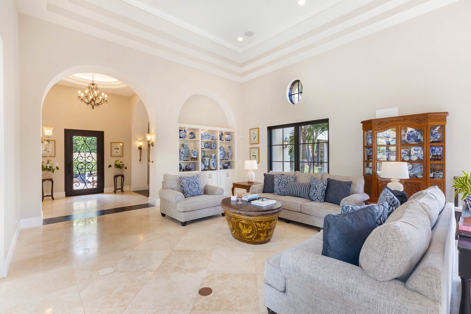 Honolulu Vacation Rentals, Royal Kahala Estate - Comfortable seating, sophisticated décor, and soaring ceilings that amplify the sense of space and luxury.