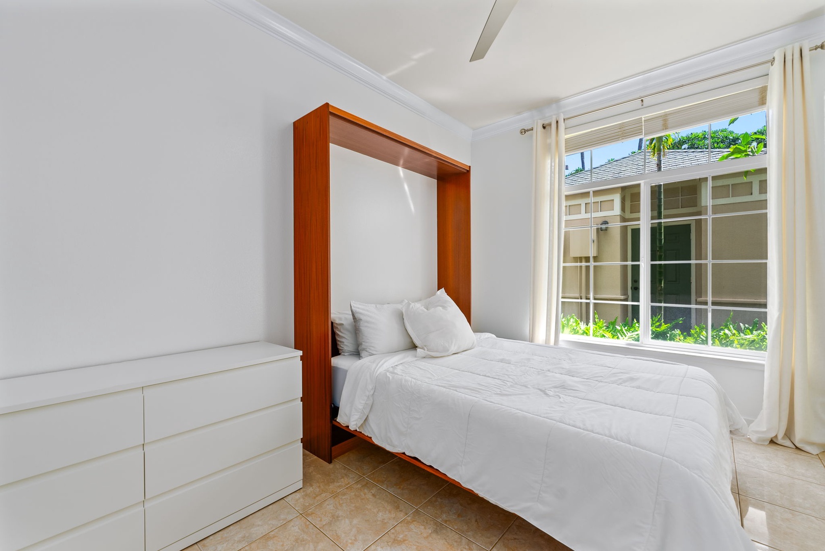 Kapolei Vacation Rentals, Kai Lani Luxury 6D - Bright guest suite featuring a queen-sized bed and ample natural light, creating a relaxing retreat.