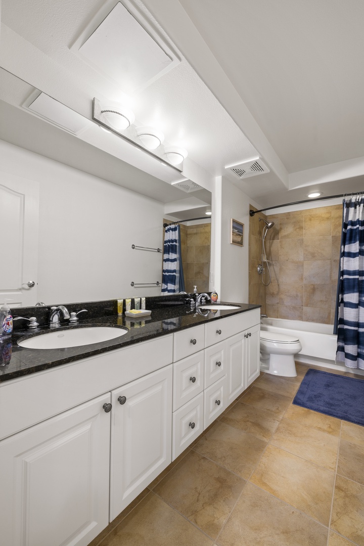 Start your day with plenty of space to get ready, featuring an expansive vanity and ample storage.