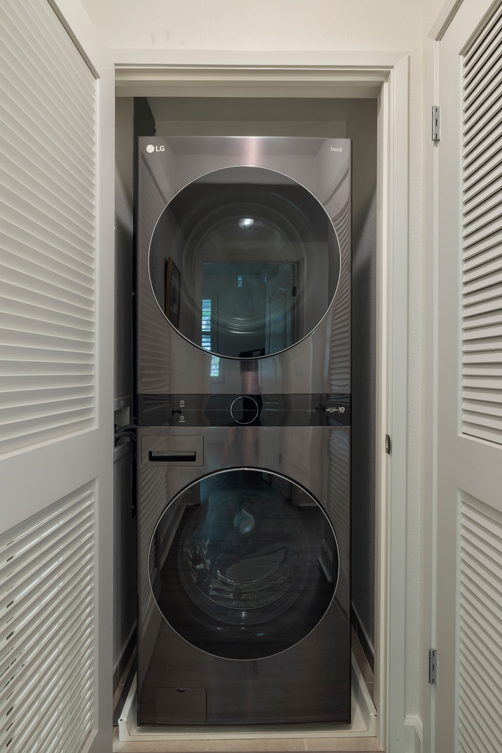 Kapolei Vacation Rentals, Ko Olina Kai 1061F - Your laundry needs are handled with this sleek stacked washer and dryer tucked neatly in its own closet space.