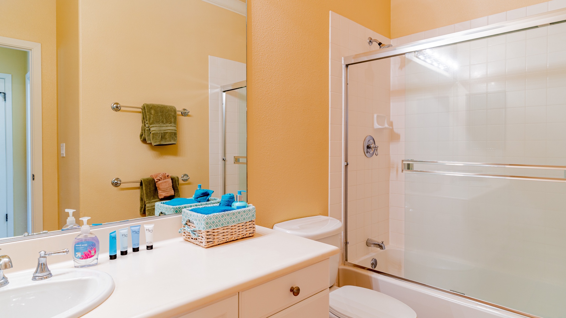 Kapolei Vacation Rentals, Coconut Plantation 1174-2 - The downstairs guest bathroom with a shower.