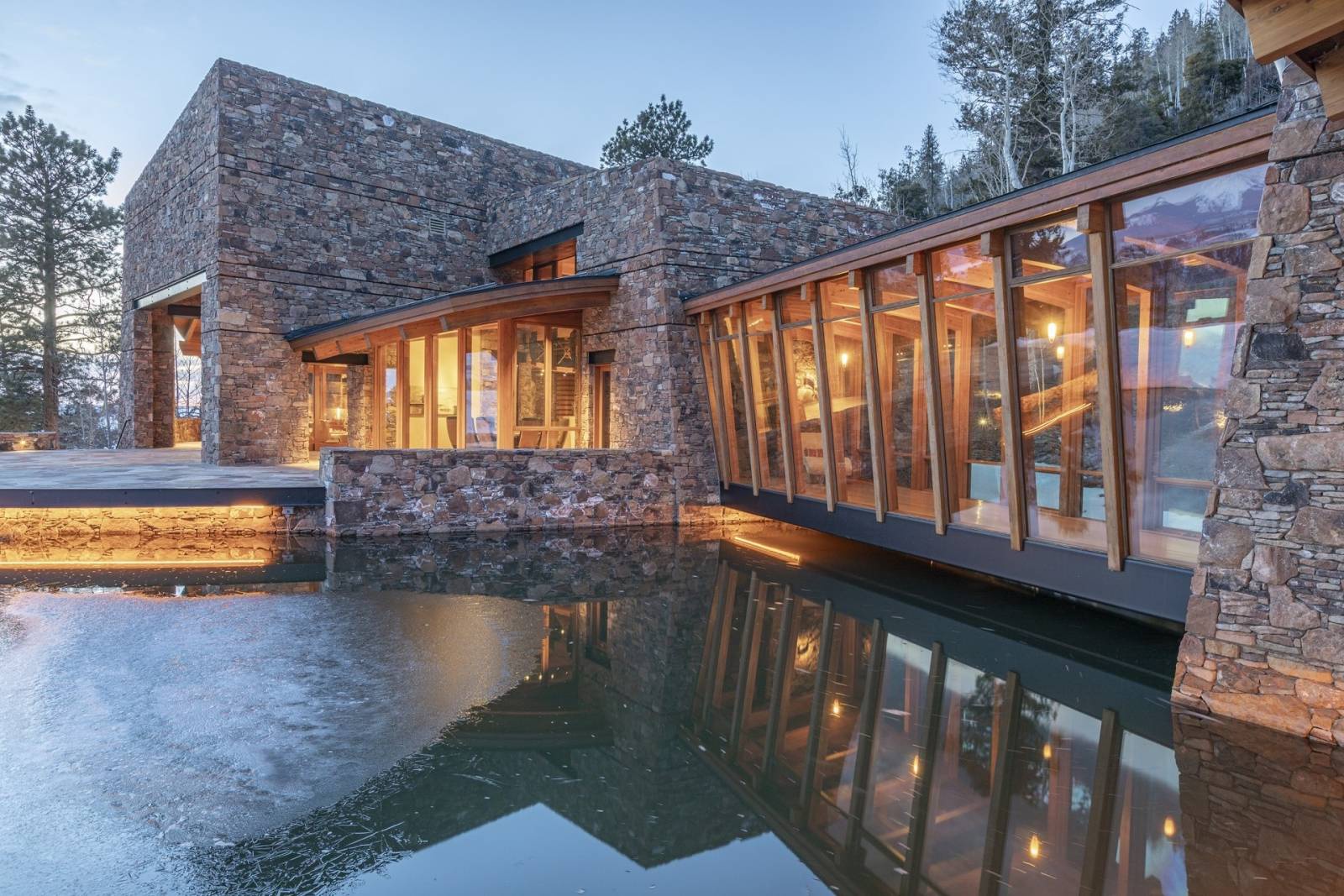 Telluride Vacation Rentals, PaGomo* - Walk across the private bridge to the East Pod to the main master bedroom which basks in the natural sunlight with panoramic views of the majestic San Juan Mountains and trout pond underway.