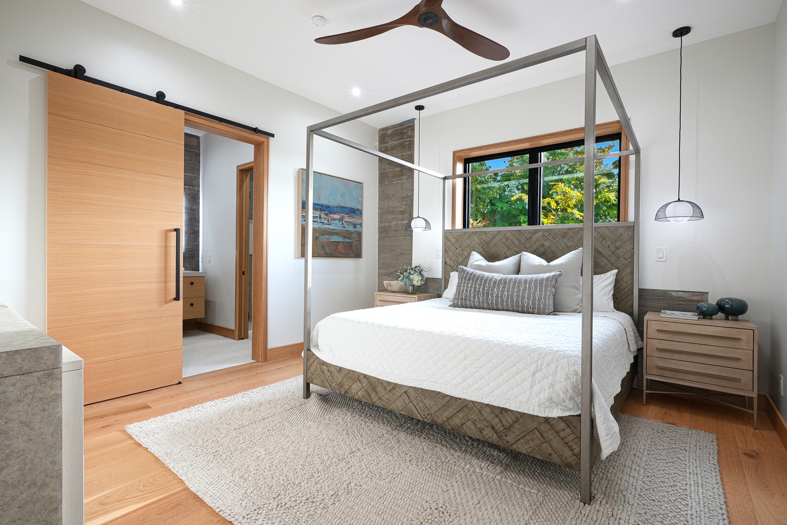 Koloa Vacation Rentals, Hale Keaka at Kukui'ula - Slumber in sophistication in this guest bedroom 2, featuring a four-poster bed and a harmonious blend of natural light and modern comfort.