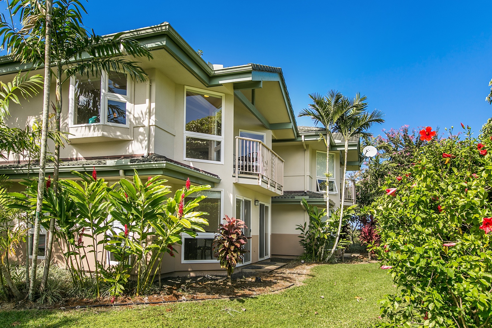 Princeville Vacation Rentals, Ku'u Lei Villa - Stroll through the beautifully manicured tropical landscaping, immersing yourself in the lush island scenery.