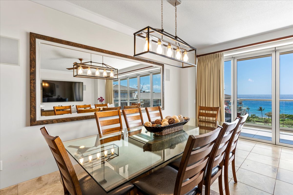 HI Vacation Rentals, Honua Kai Hokulani 825 - Gather around the dining table with ocean views as your backdrop.