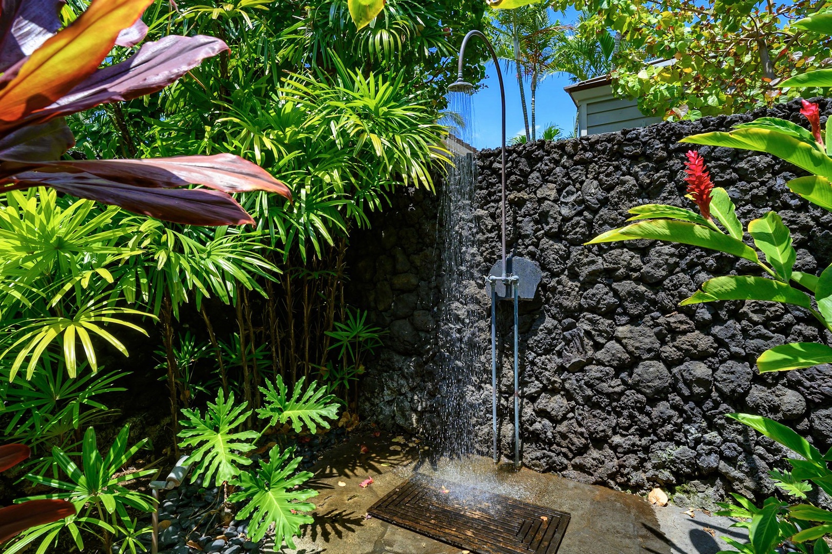 Kamuela Vacation Rentals, 3BD Na Hale 3 at Pauoa Beach Club at Mauna Lani Resort - A unique feature is the private access to a lava rock wall outdoor shower, adding a touch of island charm.