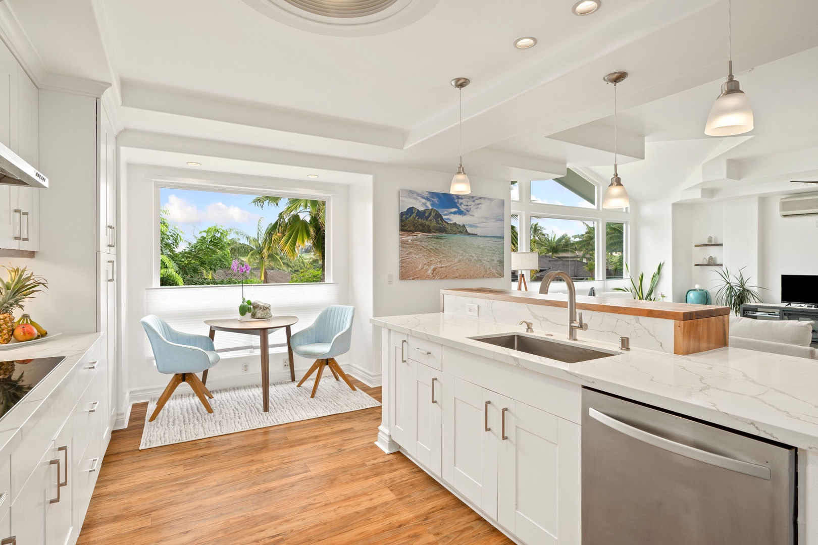Princeville Vacation Rentals, Tropical Elegance - Spacious kitchen with scenic views, perfect for your getaway meals and relaxation.