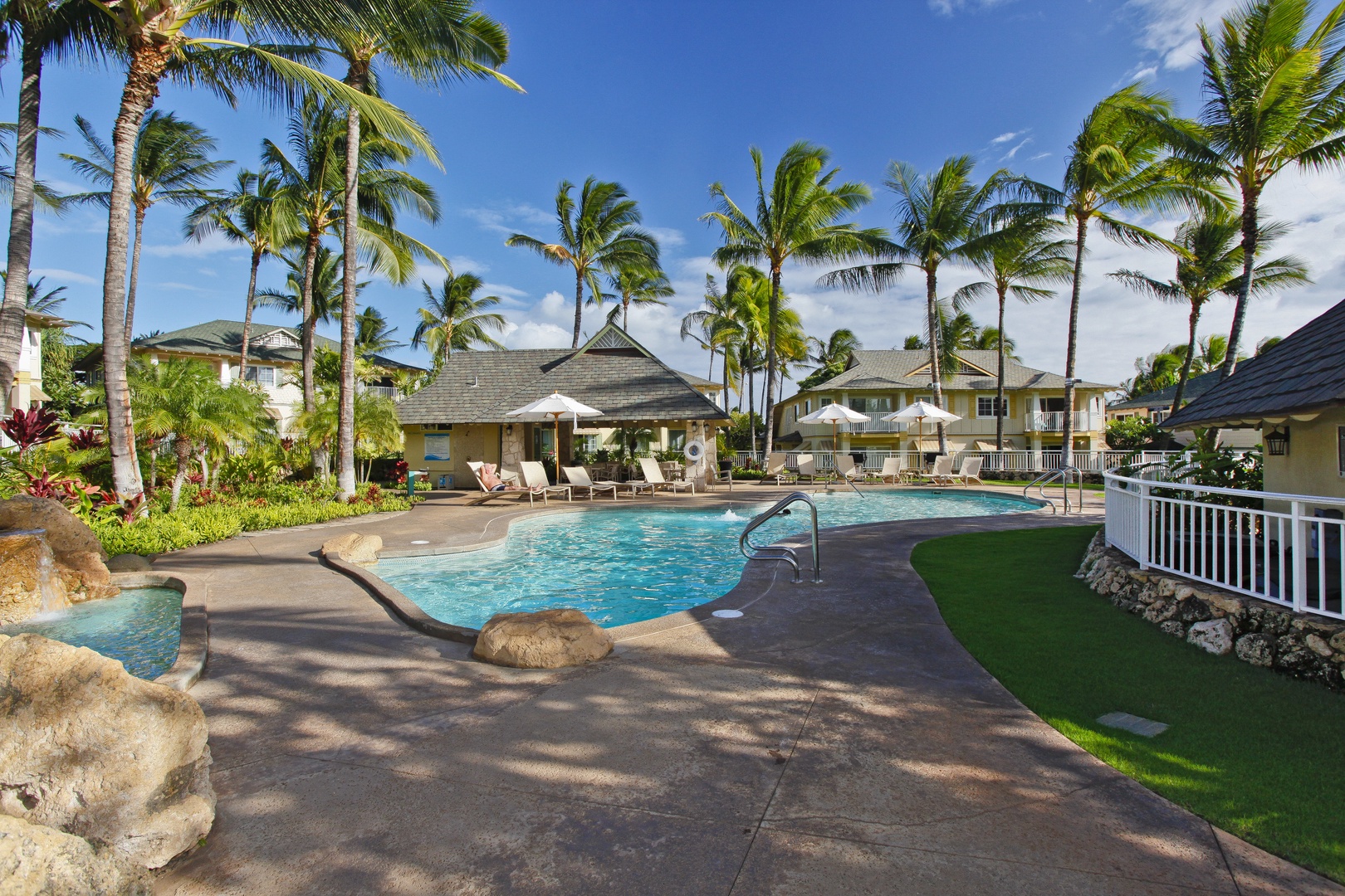 Kapolei Vacation Rentals, Kai Lani 16C - Relax by the community pool with your favorite book.