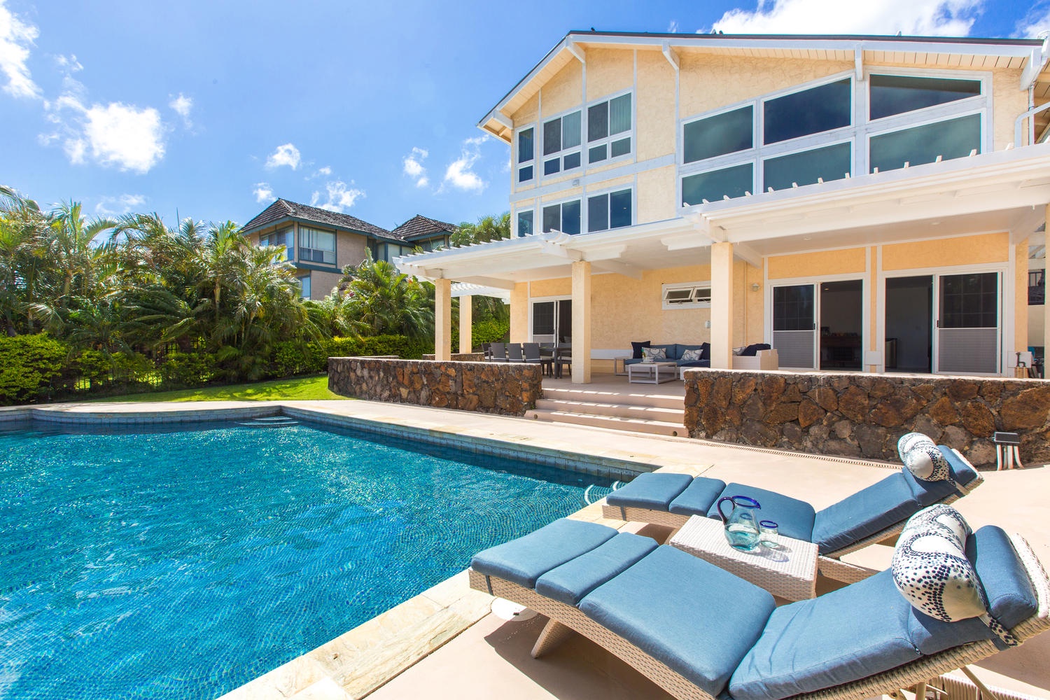 Honolulu Vacation Rentals, Mahina Kai - Lounge poolside with a Mai Tai in one hand and a good book in the other!