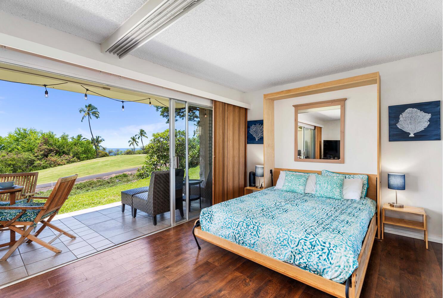 Kailua Kona Vacation Rentals, Keauhou Akahi 302 - Secondary bedroom with Queen murphy bed, shoji doors, and Lanai access.