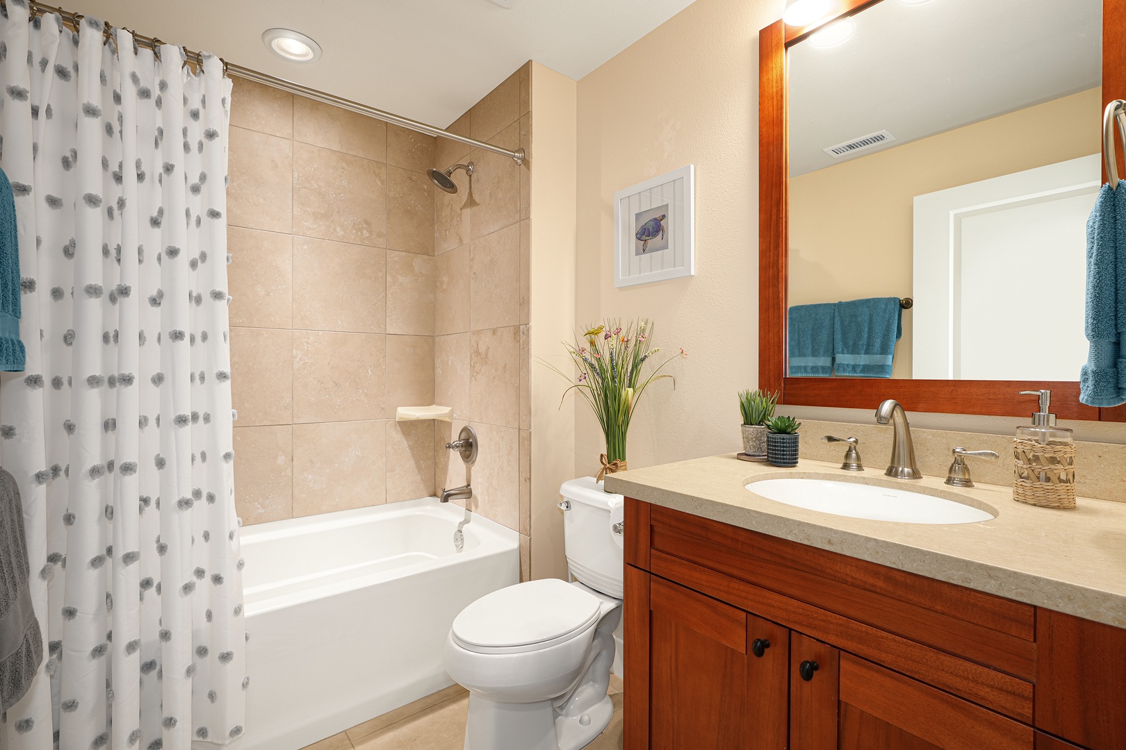 Koloa Vacation Rentals, Pili Mai 7J - Clean and bright bathroom with a full tub, spacious vanity, and plenty of storage.